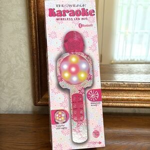 Karaoke Wireless LED Bluetooth Microphone in pink floral. Enjoy hours of fun
